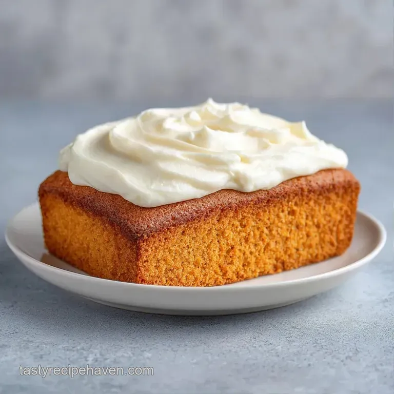 A neat slice of moist white cake on a ceramic plate, topped with a swirl of frosting and a single gold sprinkle.